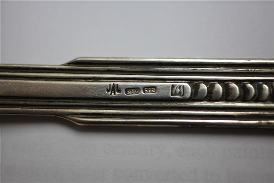 A 20th century Australian Arts & Crafts sterling silver serving spoon, by James A. Linton, 3 oz.